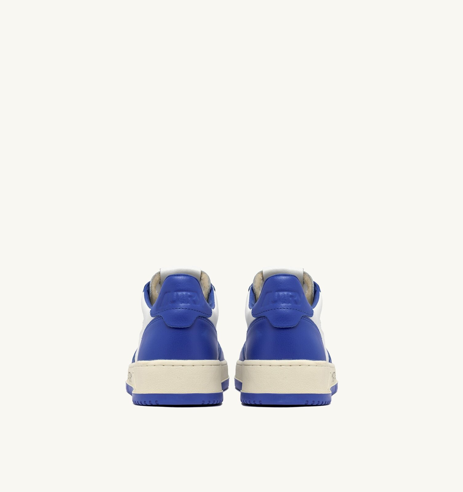 Medalist Low en cuir coloris blanc et palace blue avec lettering